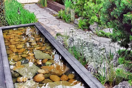 above-ground pond with stones