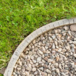 Rounded-gravel-strip-bordering-lawn