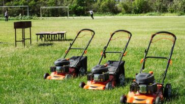 Lawn-mowers-lined-up-in-a-field